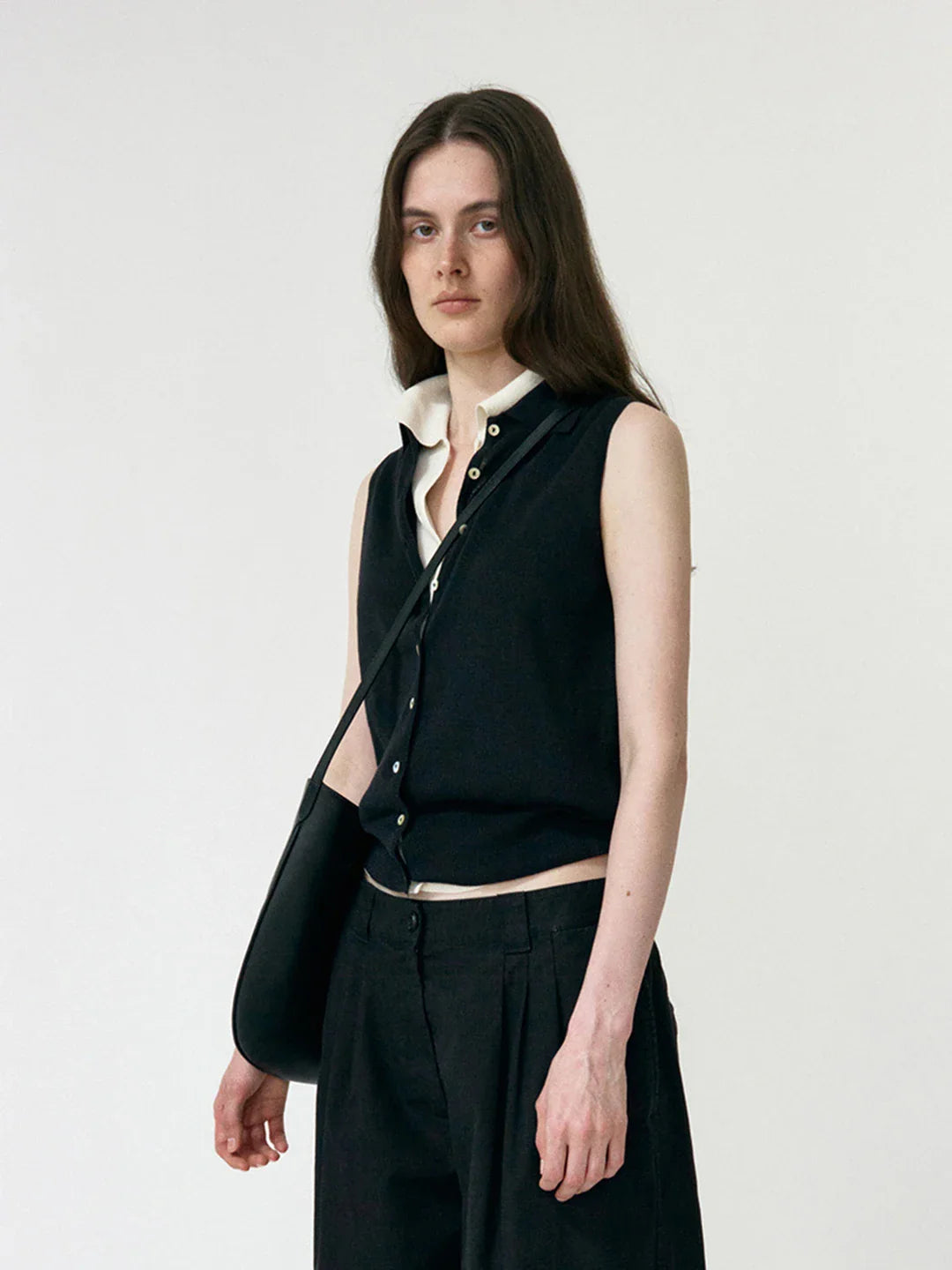 וסט סרוג עם צווארון פולו